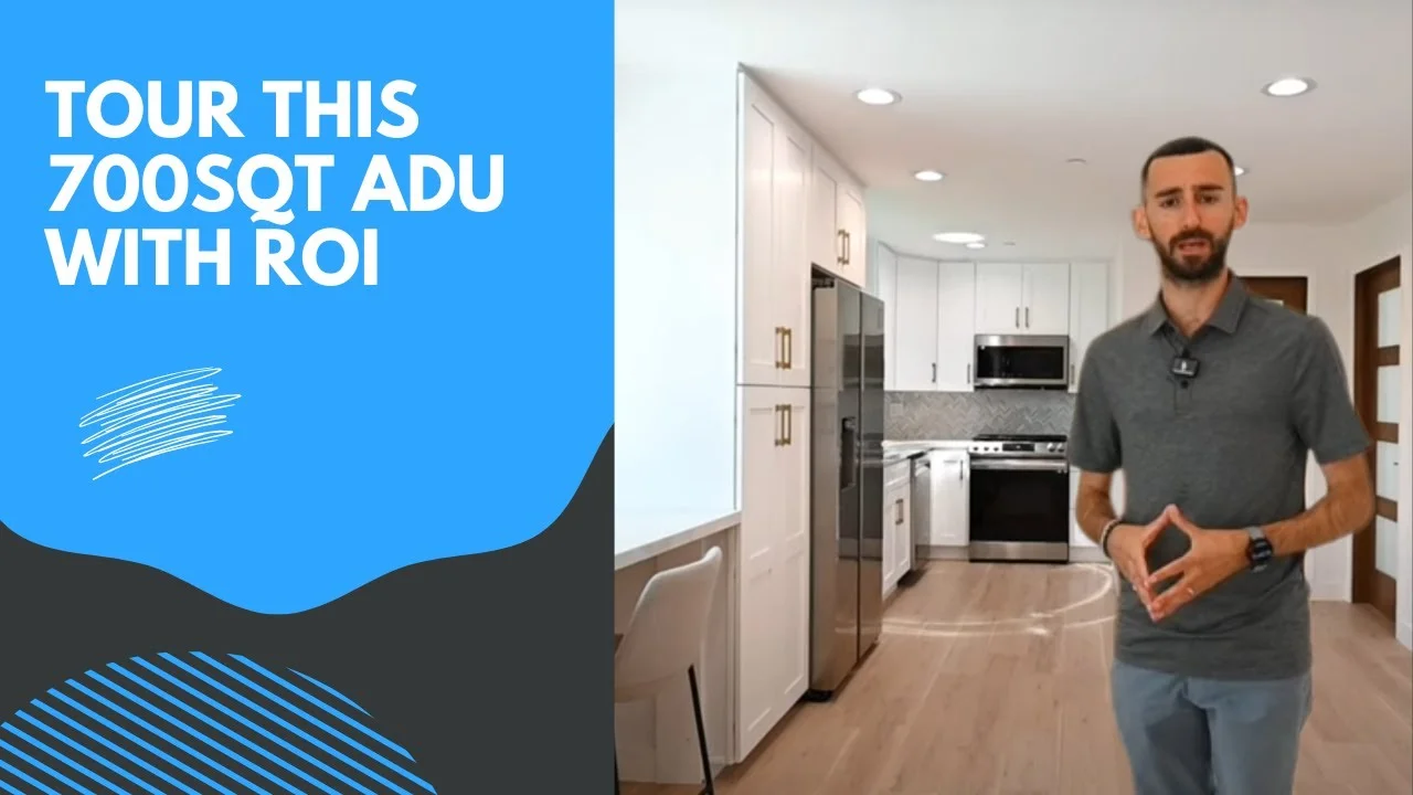 Video thumbnail showing a man presenting a 700 sq ft ADU kitchen with white shaker cabinets by RnD Builders Inc